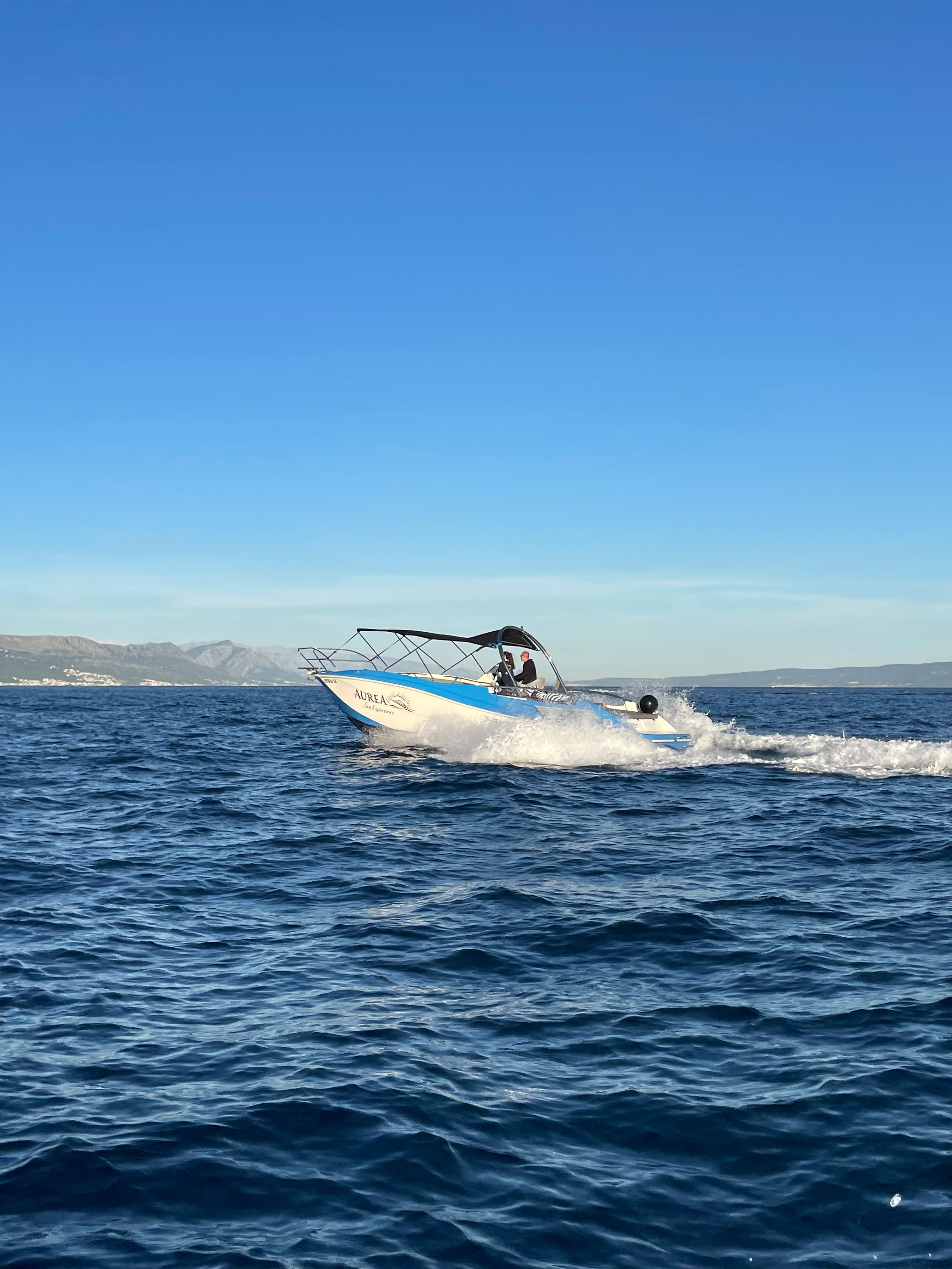 Boat cruising calm sea